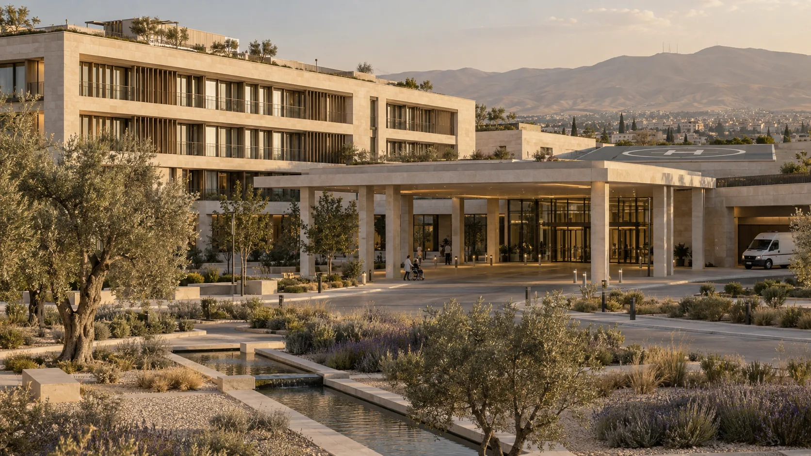 Concept: the hospital entrance — a limestone canopy on stone columns, healing gardens with olive trees and a water channel, an ambulance bay and the helipad on the roof beyond